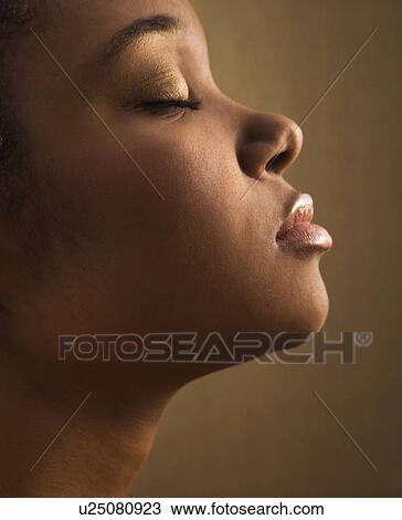 Serene portrait of female's face View Large Photo Image Stock Image - Serene portrait of female's face. Fotosearch