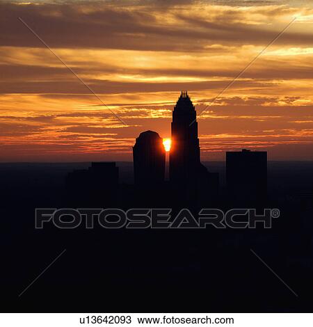 Sunset silhouetting aerial view of Charlotte, North Carolina city skyline. View Large Photo Image Stock Image - Sunset silhouetting aerial view of Charlotte, North Carolina city skyline.. Fotosearch