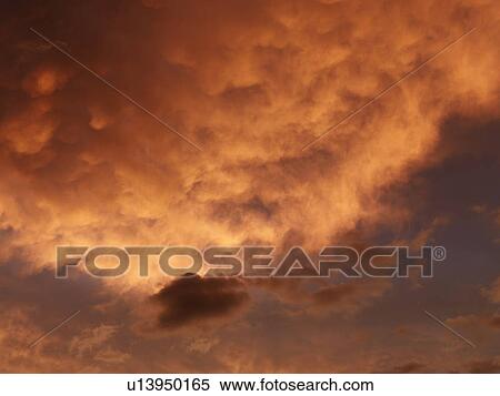 Sunset sky with orange and yellow clouds. View Large Photo Image Stock Photography - Sunset sky with orange and yellow clouds.. Fotosearch