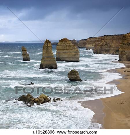 Twelve Apostles rock formation on coastline as seen from the Great Ocean Road, Australia. View Large Photo Image Stock Photograph - Twelve Apostles rock formation on coastline as seen from the Great Ocean Road, Australia.. Fotosearch