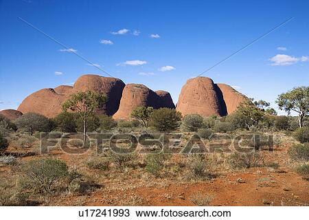 Stock Image - Uluru Kata Tjuta National Park, Australia with Mount Olga in the distance.. Fotosearch