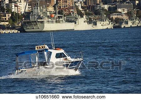 Water taxi and view of buildings and boats in Sydney, Australia. View Large Photo Image Stock Image - Water taxi and view of buildings and boats in Sydney, Australia.. Fotosearch