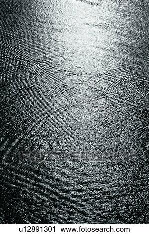 Stock Image - Waves in ocean water. Fotosearch