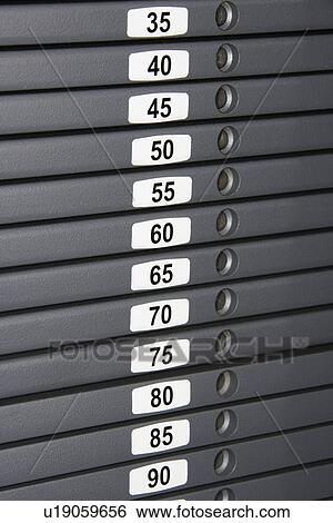 Stock Photograph - Weights on finess machine.. Fotosearch