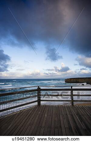 Stock Image - Wooden deck on coastline of Great Ocean Road, Australia.. Fotosearch