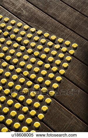 Yellow dot pattern on wooden flooring. View Large Photo Image Stock Photography - Yellow dot pattern on wooden flooring.. Fotosearch