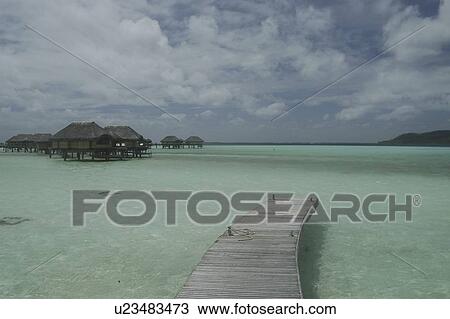 Beach apartments at Tahaha 5 star resort, Raiatia, French Polynesia, Southern Pacific Ocean View Large Photo Image Stock Image - Beach apartments at Tahaha 5 star resort, Raiatia, French Polynesia, Southern Pacific Ocean. Fotosearch