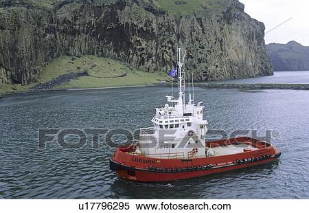 Pilot boat in the harbour of Heimaey. Vestmannaeyjar Islands, Southern Iceland View Large Photo Image Stock Photography - Pilot boat in the harbour of Heimaey. Vestmannaeyjar Islands, Southern Iceland. Fotosearch