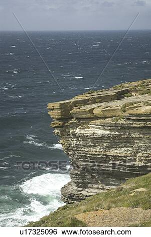Stock Photograph - Rocky west coast of mainland Orkney, Scotland, UK. Fotosearch