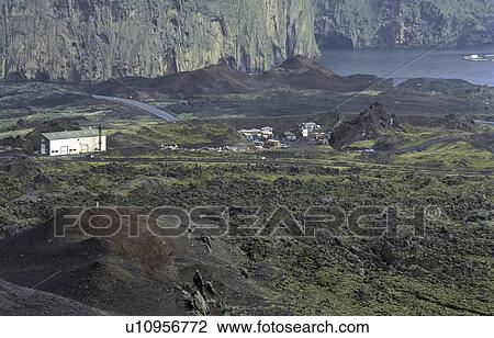 Stock Image - View from the Volcano Eldfell towards the harbour of Heimaey. Vestmannaeyjar Islands, Southern Iceland. Fotosearch