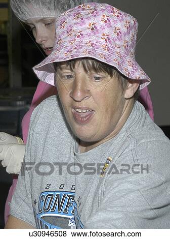 Stock Photo - Face of a woman with disabilities.. Fotosearch