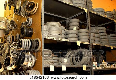 Supply room in a wheelchair repair shop. View Large Photo Image Stock Photograph - Supply room in a wheelchair repair shop.. Fotosearch