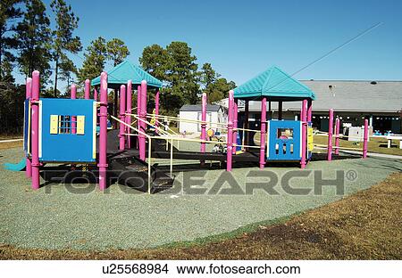 Wonderful new playground at a local school, totally accessible via universal design for all children, with and without disabilities. View Large Photo Image Picture - Wonderful new playground at a local school, totally accessible via universal design for all children, with and without disabilities.. Fotosearch