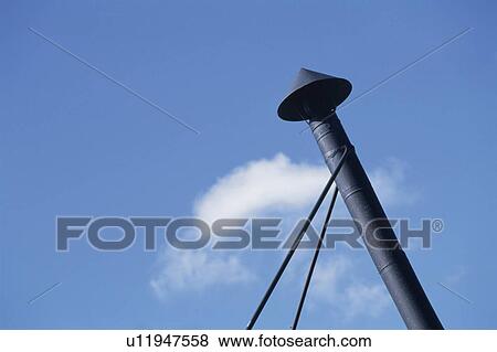 Stock Photo - A Blue Sky And A Chimney. Fotosearch