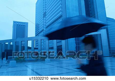 Businessman With Umbrella View Large Photo Image Stock Image - Businessman With Umbrella. Fotosearch