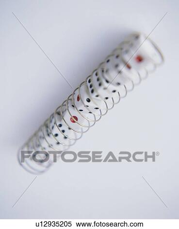 Stock Photography - Dice In Coiled Spring. Fotosearch