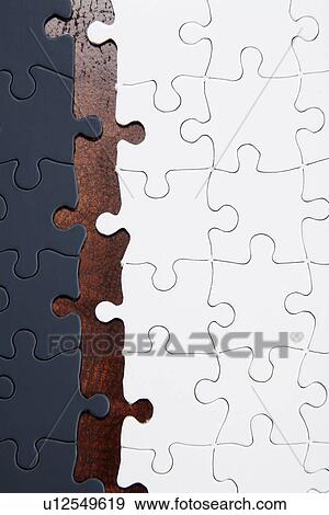 Stock Photo - Gray and White Jigsaw Pieces. Fotosearch
