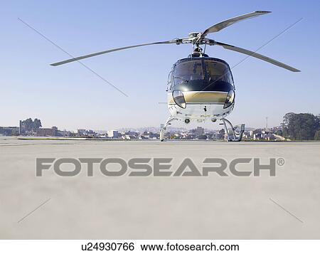 Stock Photograph - Helicopter on tarmac, Carapicuiba, Sao Paulo, Brazil. Fotosearch