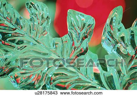 Stock Image - Ice In Eulalia Leaf Shape. Fotosearch