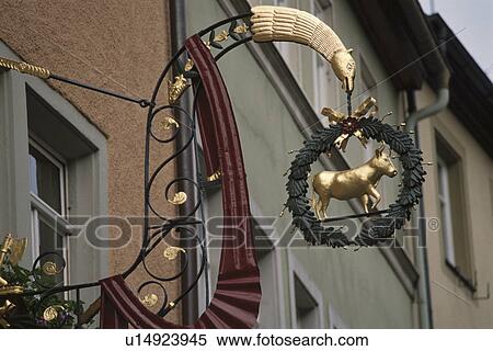 It Hangs And Is A Signboard. View Large Photo Image Stock Photography - It Hangs And Is A Signboard.. Fotosearch