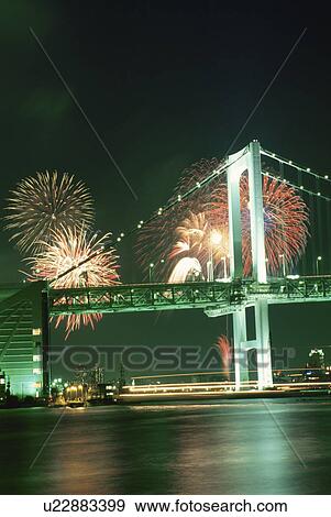 Stock Photo - Rainbow Bridge And Fireworks. Fotosearch