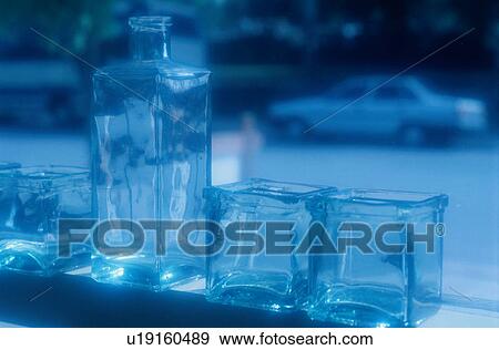 Stock Photo - Row Of Glass Jars. Fotosearch