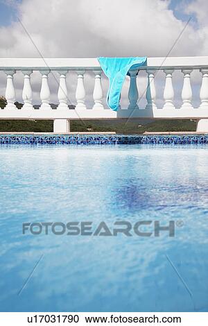 Two towels drying on railings View Large Photo Image Stock Image - Two towels drying on railings. Fotosearch