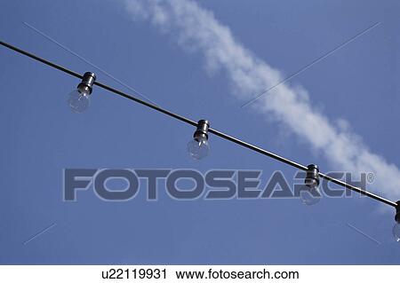 A Blue Sky And An Electric Bulb View Large Photo Image Stock Image - A Blue Sky And An Electric Bulb. Fotosearch