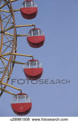 A Ferris Wheel And The Sky View Large Photo Image Stock Photo - A Ferris Wheel And The Sky. Fotosearch