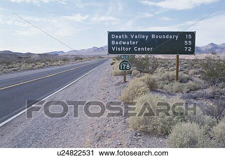 Stock Image - A Road And A Sign. Fotosearch