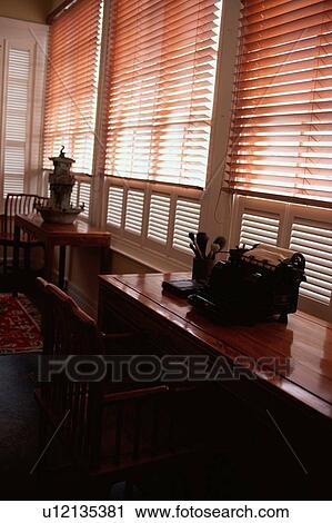 Stock Image - Antique Typewriter Near Window. Fotosearch