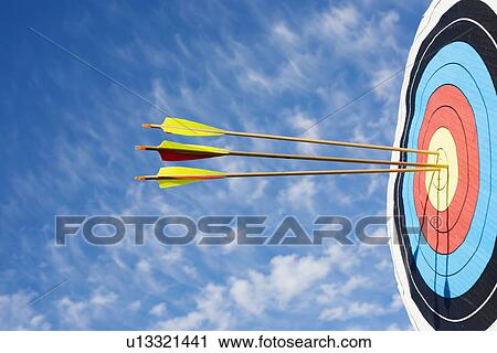 Arrows in bullseye of target View Large Photo Image Stock Image - Arrows in bullseye of target. Fotosearch