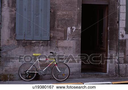 Bicycle Leaning Against Wall View Large Photo Image Stock Photo - Bicycle Leaning Against Wall. Fotosearch