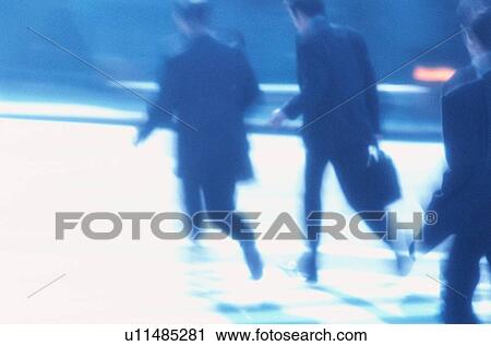 Stock Image - Businessmen Running. Fotosearch