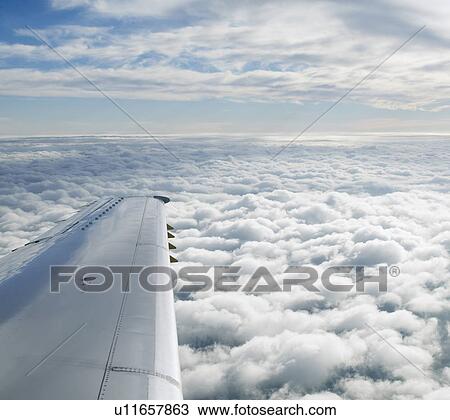 Clouds Seen From Airplane View Large Photo Image Stock Image - Clouds Seen From Airplane. Fotosearch