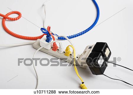 Stock Photo - Computer Cables Attached To Extension Cord. Fotosearch