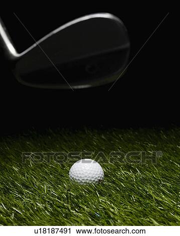 Stock Image - Golf Club Hitting Ball. Fotosearch