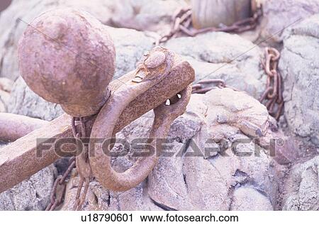 Stock Image - Iron Poll Near Chain. Fotosearch