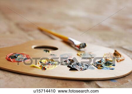 Stock Image - Paint palette and brush. Fotosearch