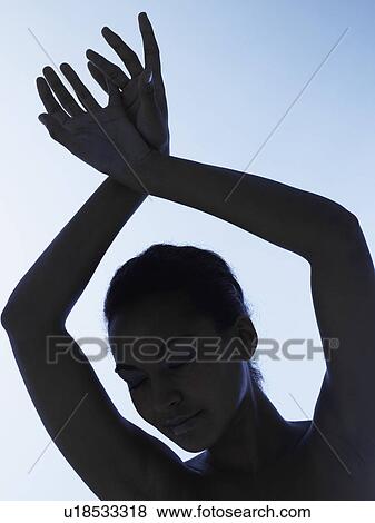 Stock Photo - Silhouette of young woman. Fotosearch