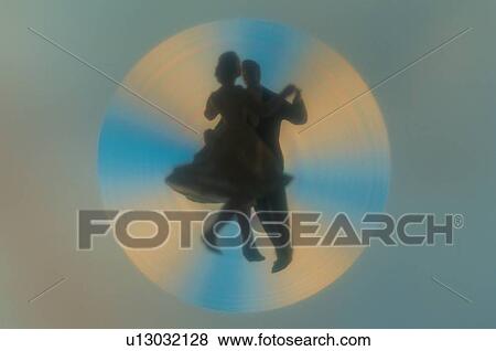 Stock Photo - Silhouetted Dancing Couple. Fotosearch