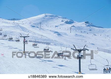 Stock Photo - Ski Lift Going Up Mountain. Fotosearch