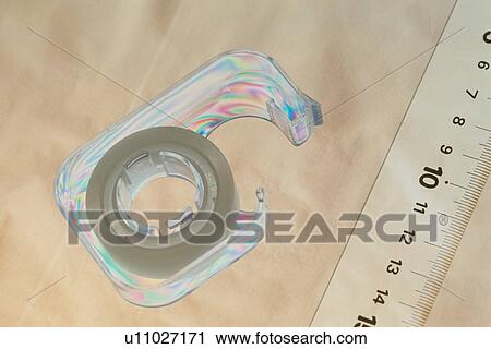 Stock Image - Tape Near Ruler. Fotosearch