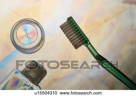 Stock Image - Toothbrush Near Plastic Bottle. Fotosearch