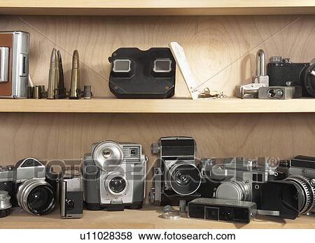 Stock Photo - Vintage Cameras on Shelf. Fotosearch