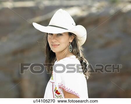 Woman wearing cowboy hats, portrait View Large Photo Image Stock Image - Woman wearing cowboy hats, portrait. Fotosearch