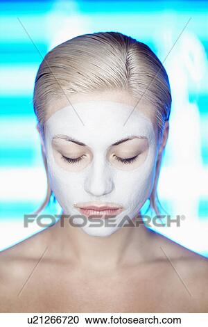 Young woman with face mask View Large Photo Image Stock Image - Young woman with face mask. Fotosearch