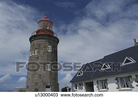 Stock Image - A Lighthouse And The Sky. Fotosearch