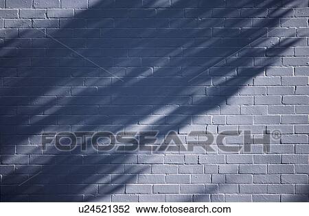Stock Image - Brick Wall In Shadow. Fotosearch