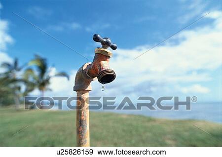 Dripping Faucet Near Beach View Large Photo Image Stock Photo - Dripping Faucet Near Beach. Fotosearch